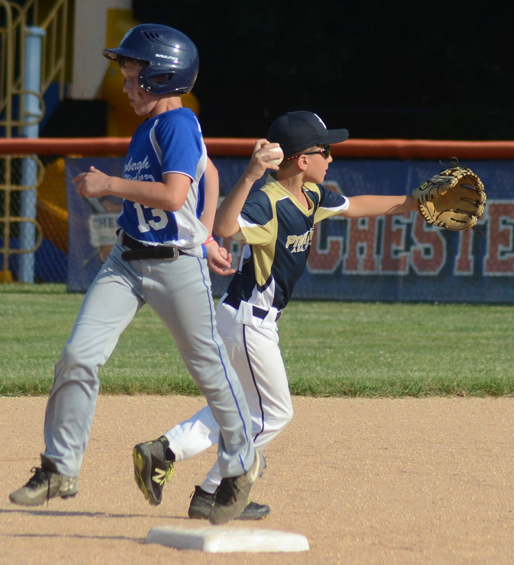 Pine Bush shortstop Trevor Fontana makes a relay throw to first base after forcing out Town of Newburgh-New Windsor’s James Lilla during a District 19 Minors (8/10) baseball game at Chester Little League on June 29.